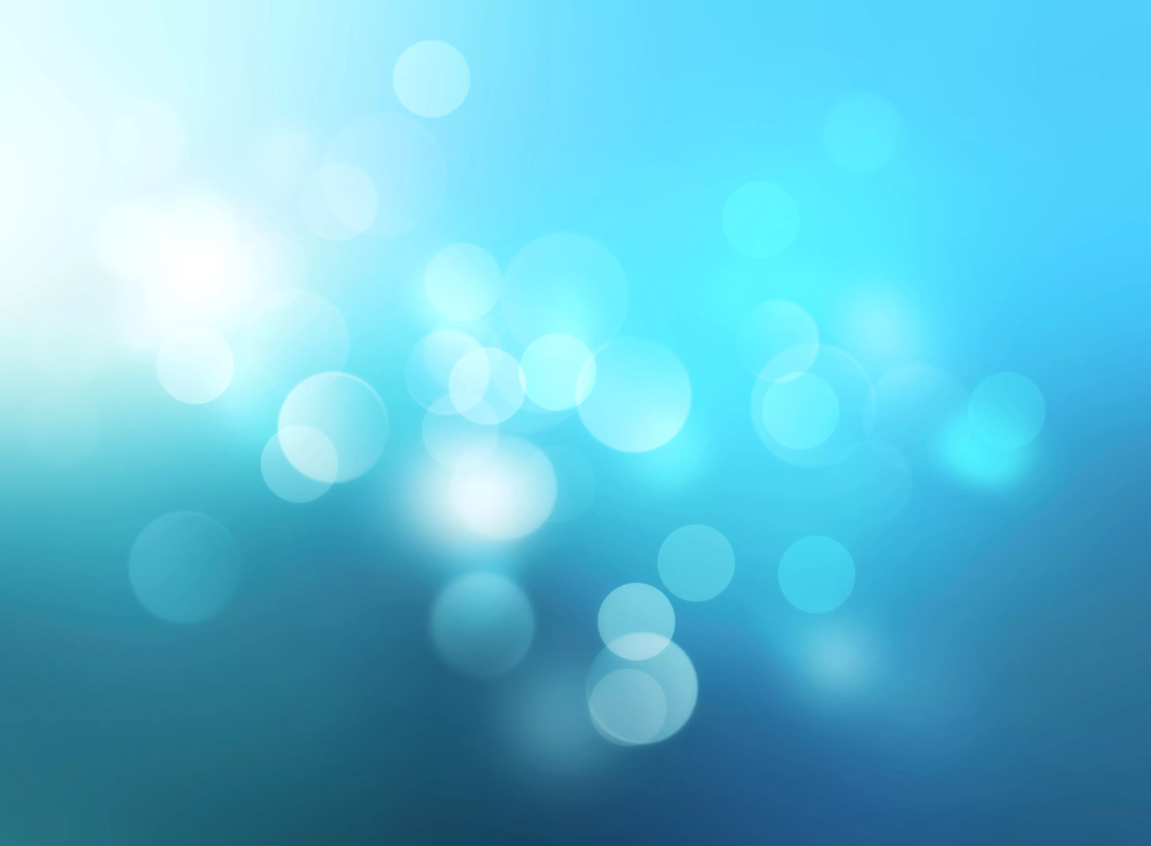 White light flares against a blue to turquoise background
